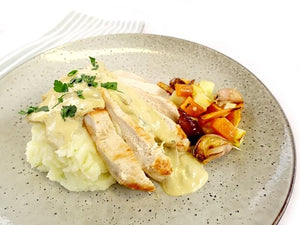 Chicken with garlic mushroom sauce, white potato mash and roasted vegetables