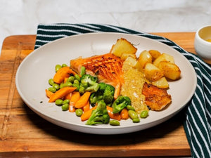 Honey mustard salmon with roasted potatoes and buttered vegetables